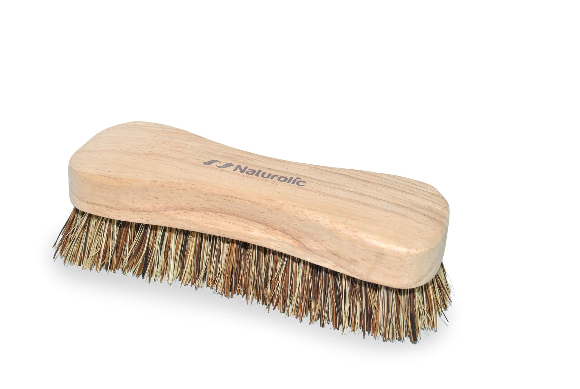 Natural fiber scrub brush with a wooden handle for eco-friendly cleaning solutions.