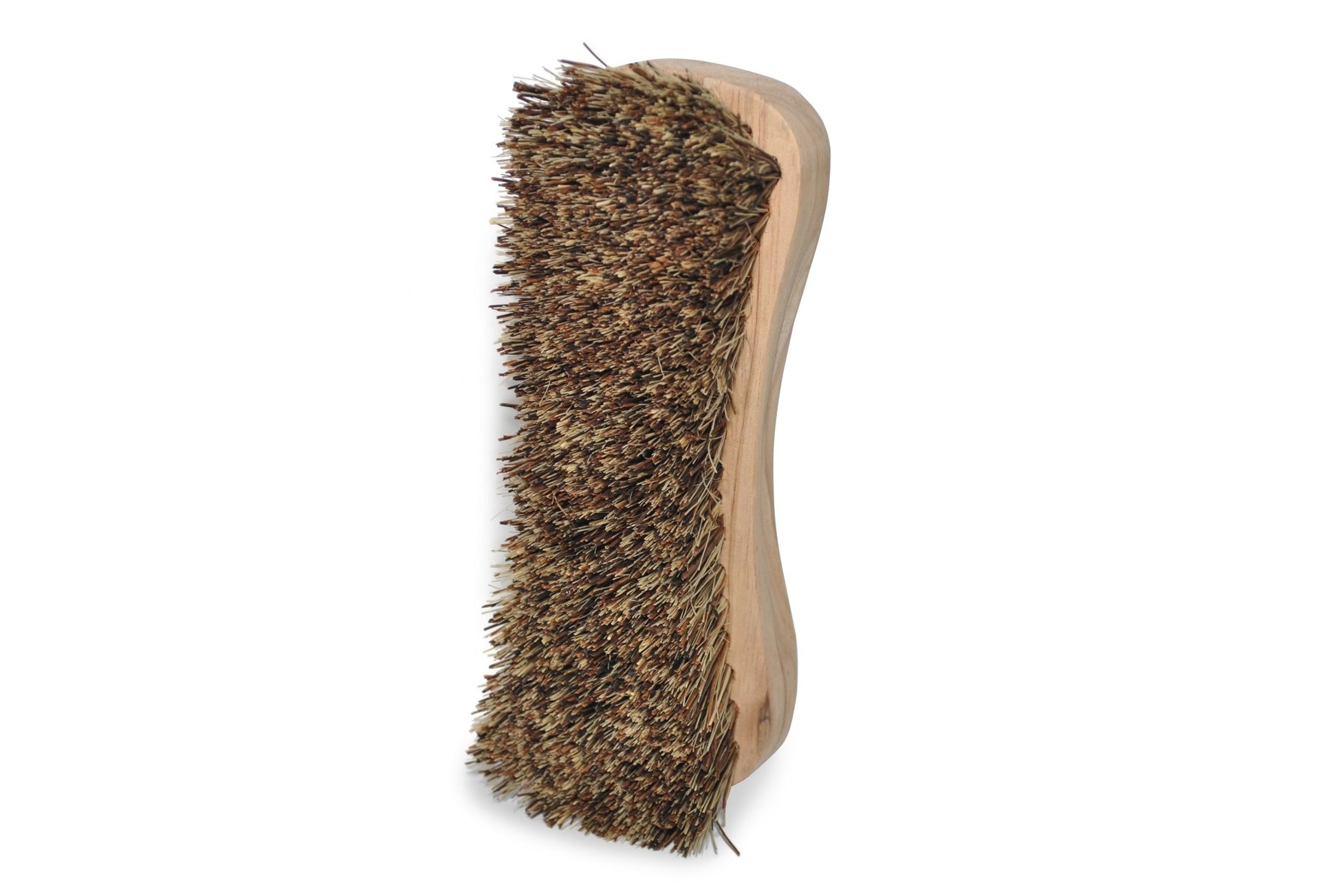 Natural fiber scrub brush featuring a wooden handle and durable bristles for eco-friendly cleaning.